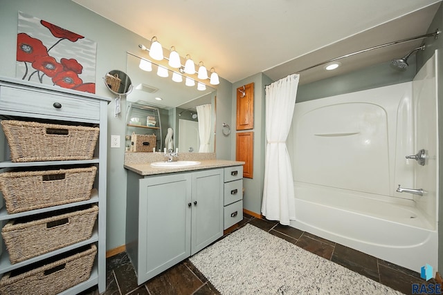 bathroom with vanity and shower / tub combo with curtain