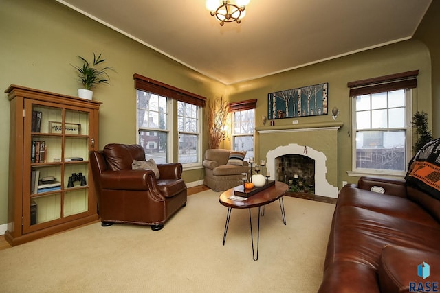 living room featuring carpet and a healthy amount of sunlight