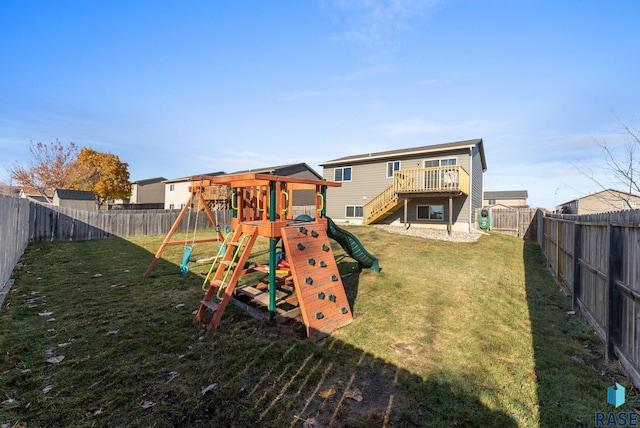 view of jungle gym with a lawn