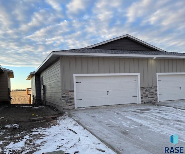 view of snow covered garage