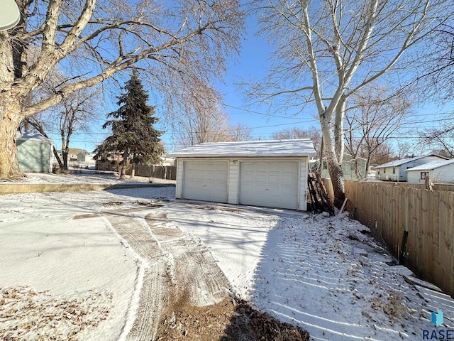 view of snow covered garage