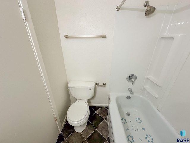 bathroom featuring toilet and tile patterned flooring