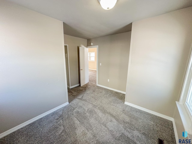 view of carpeted spare room