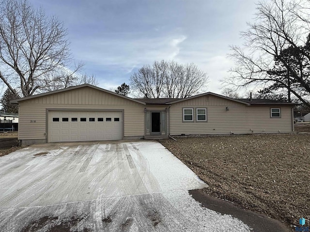 ranch-style house featuring a garage