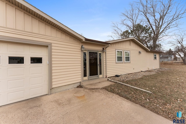 property entrance featuring a garage