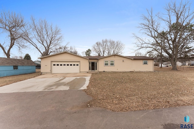 ranch-style home with a garage