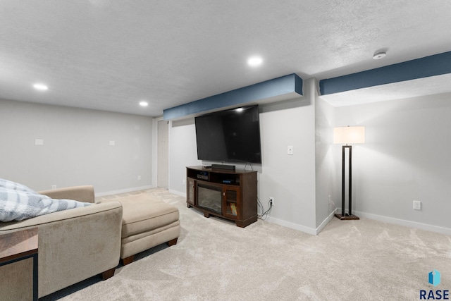 living room featuring a textured ceiling and light carpet