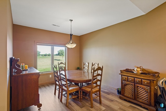 dining area with light wood-type flooring