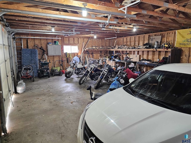 garage with a workshop area