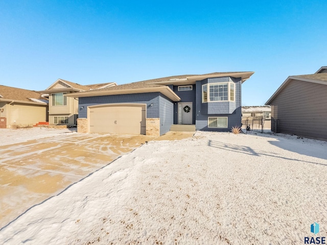 view of front of home with a garage