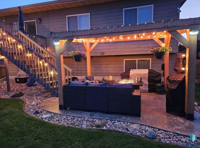 view of patio with outdoor lounge area and grilling area