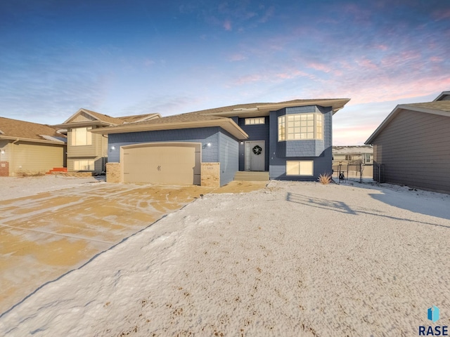 view of front of home with a garage