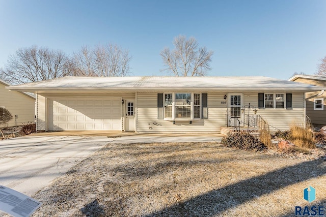 ranch-style home with a garage