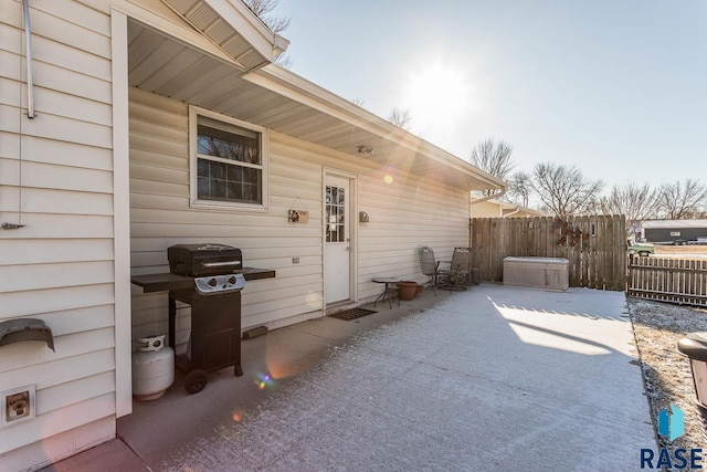 property entrance featuring a patio area