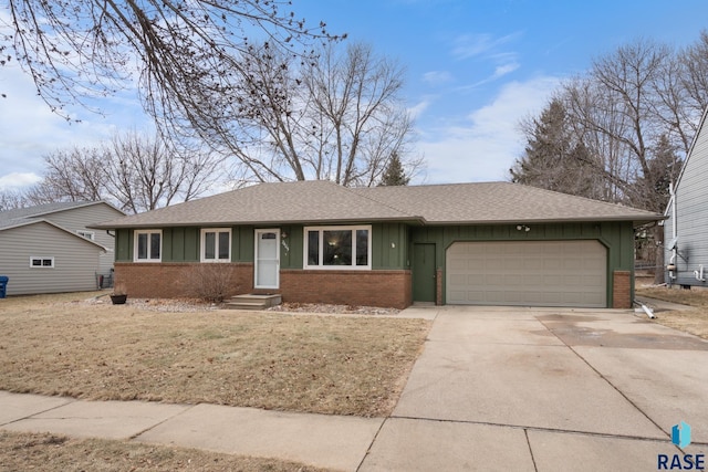 ranch-style house featuring a garage