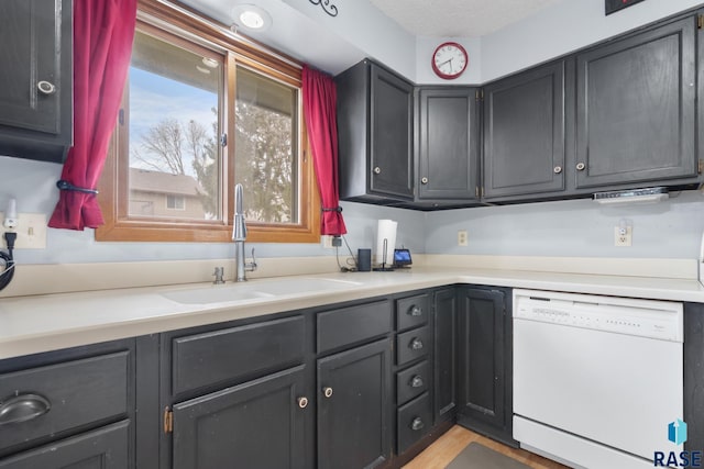 kitchen with dishwasher and sink