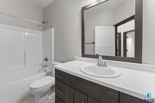 full bathroom with toilet, bathtub / shower combination, and vanity