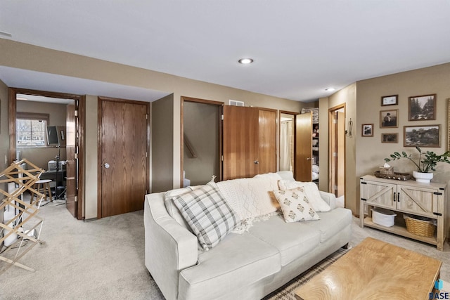 living room featuring light colored carpet