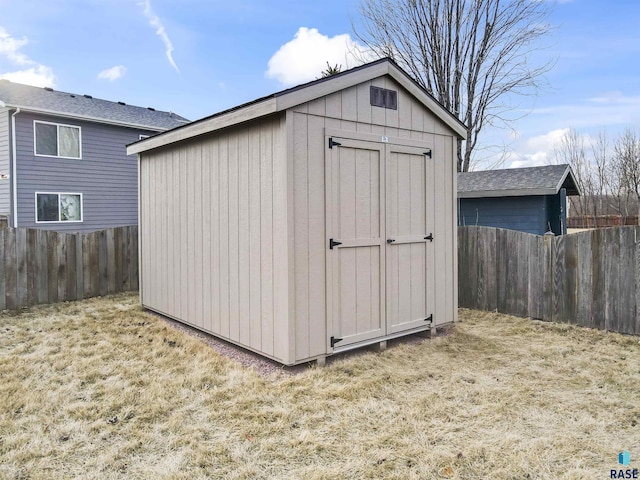 view of outdoor structure with a lawn