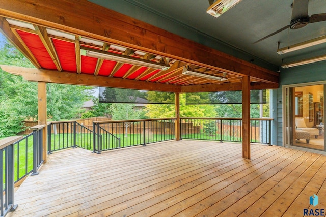 wooden terrace featuring ceiling fan