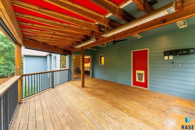 wooden deck featuring heating unit