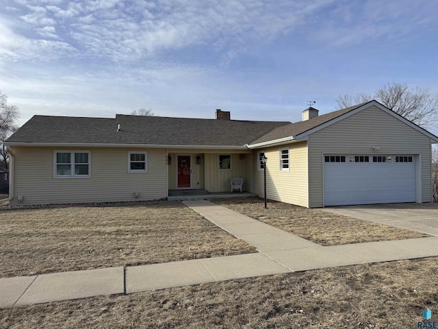 single story home featuring a garage