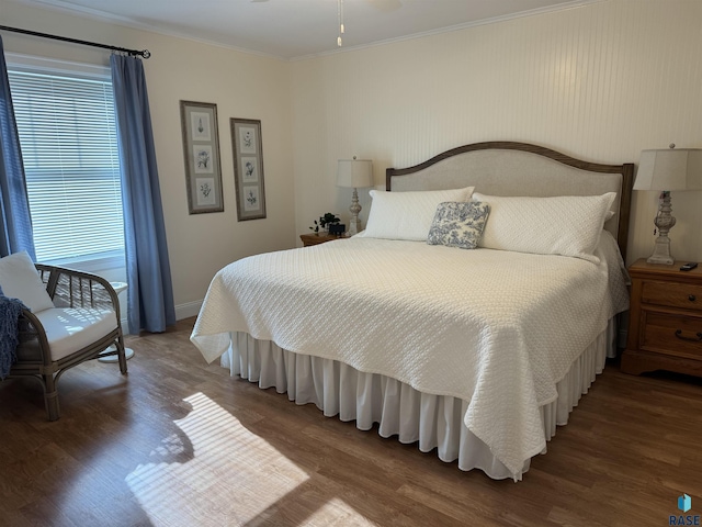 bedroom featuring crown molding and hardwood / wood-style floors