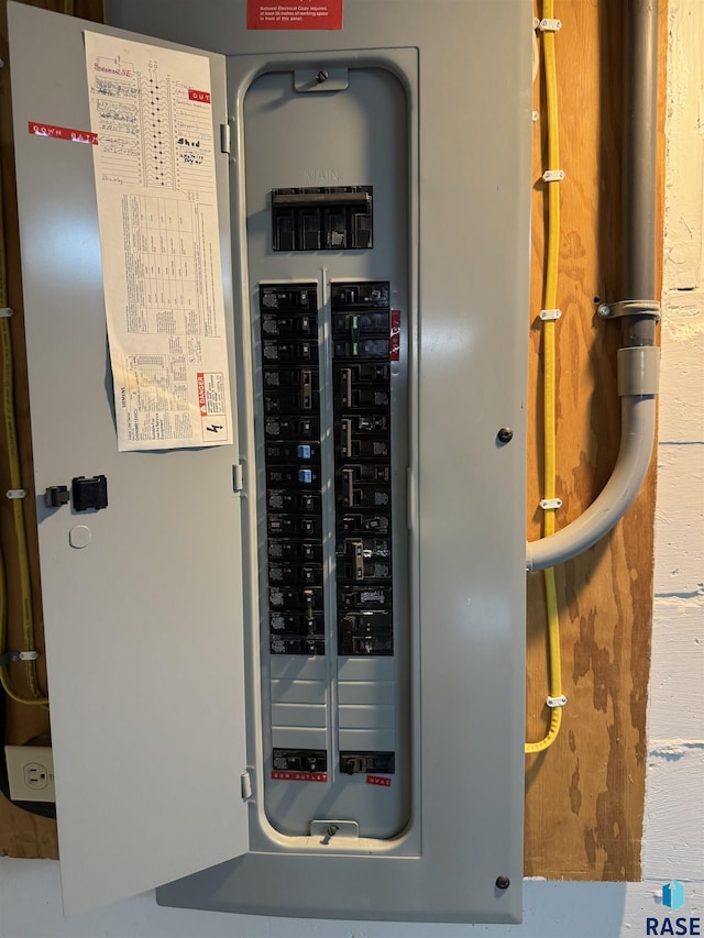 utility room featuring electric panel