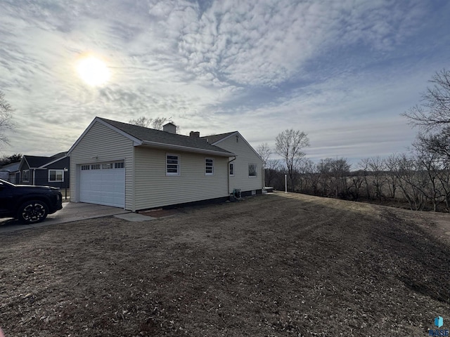 view of home's exterior with a garage