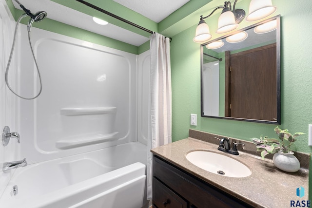 bathroom featuring shower / bathtub combination with curtain and vanity