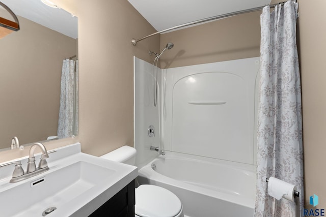 full bathroom with toilet, vanity, and shower / tub combo with curtain