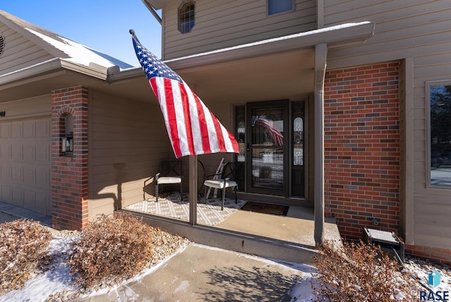 property entrance with a garage