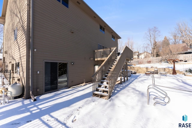 view of snow covered property