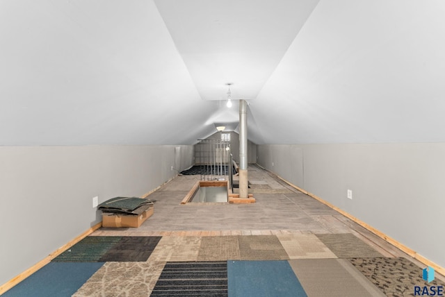 bonus room featuring lofted ceiling