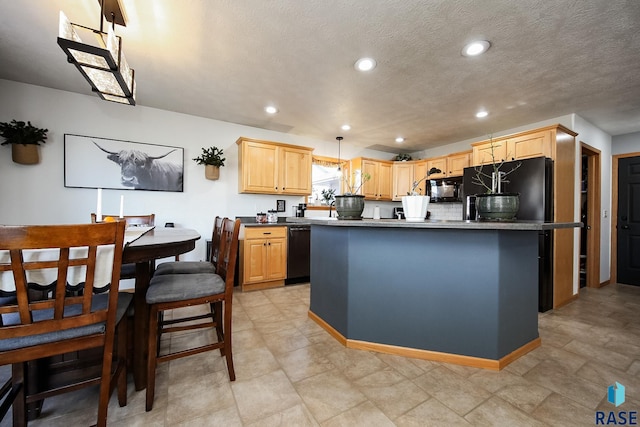 kitchen featuring a textured ceiling, black appliances, a center island, light brown cabinets, and hanging light fixtures