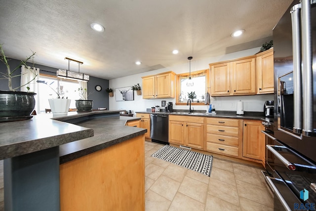 kitchen featuring dark countertops, light brown cabinets, a sink, dishwasher, and stainless steel fridge with ice dispenser