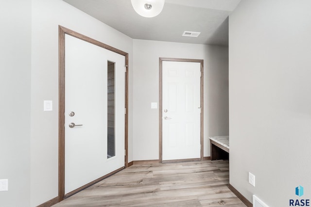 interior space with light hardwood / wood-style floors