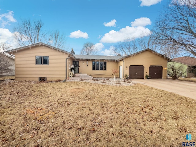 ranch-style house with a garage