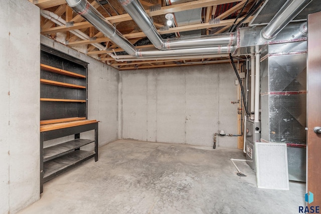 basement featuring heating unit