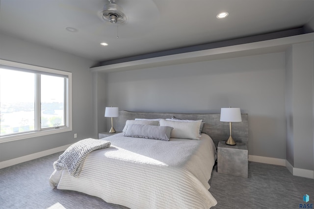 bedroom with ceiling fan and carpet