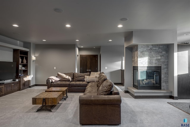 carpeted living room featuring a brick fireplace