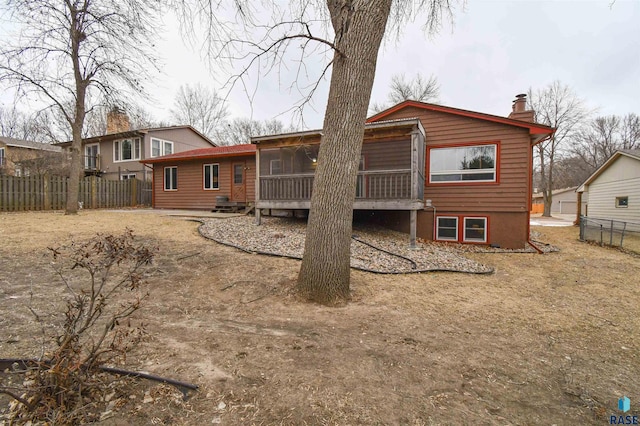 rear view of house with a sunroom