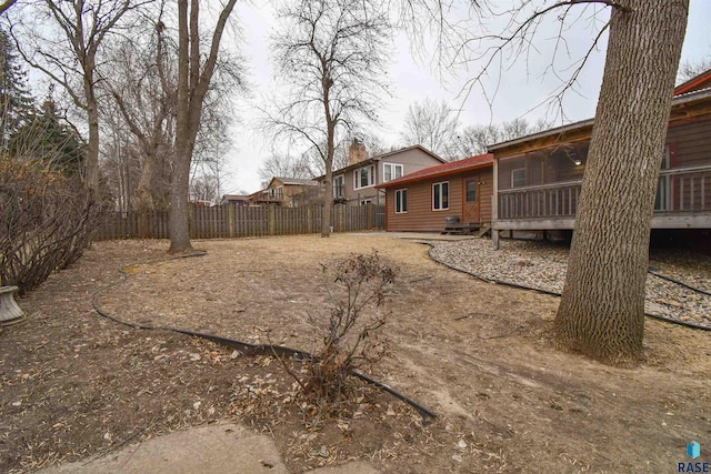 view of yard with a sunroom