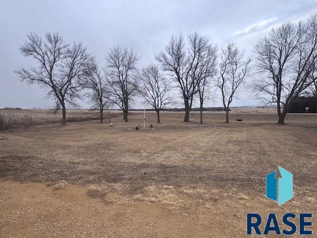 view of yard with a rural view