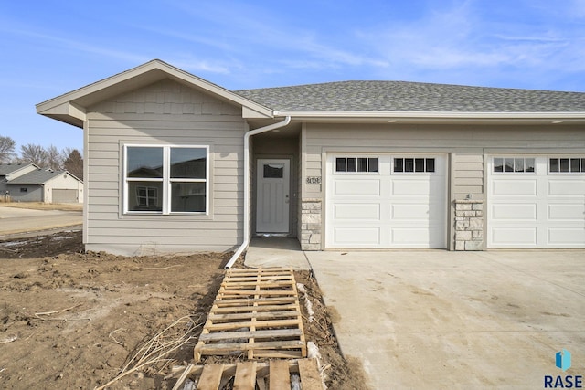 ranch-style house with a garage