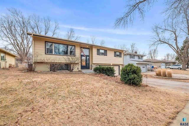 bi-level home featuring a garage