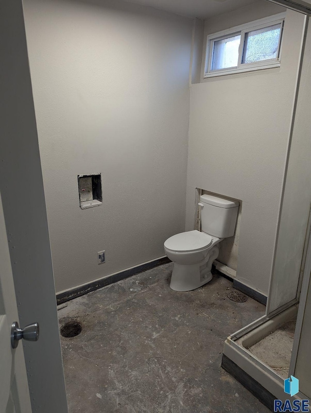 bathroom featuring toilet