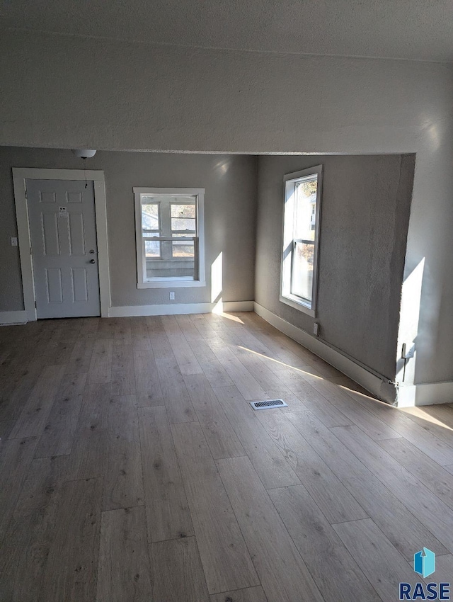 entrance foyer featuring light wood-type flooring