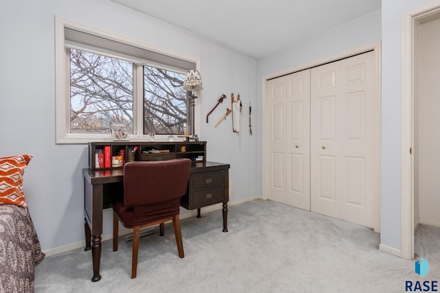 office space featuring light colored carpet