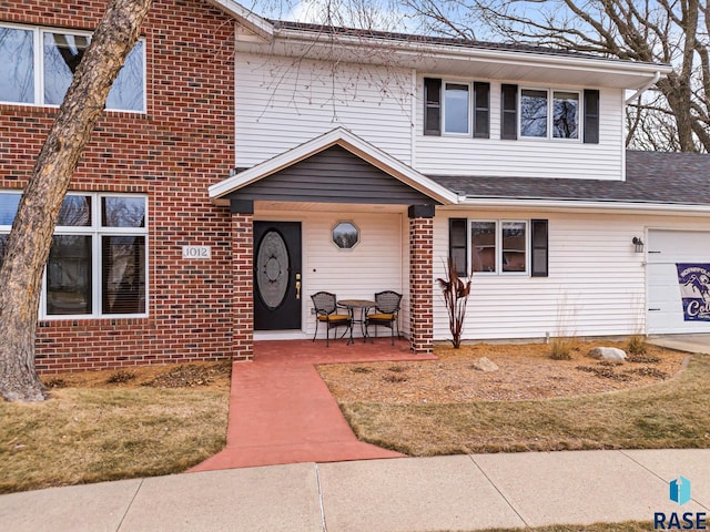 view of front of property with a garage